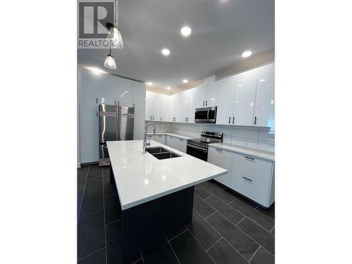 4109 Golden Place, Terrace, BC - Indoor Photo Showing Kitchen With Double Sink With Upgraded Kitchen