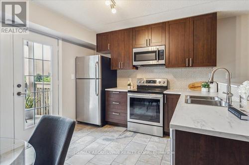 305 - 4005 Kilmer Drive, Burlington (Tansley), ON - Indoor Photo Showing Kitchen With Double Sink