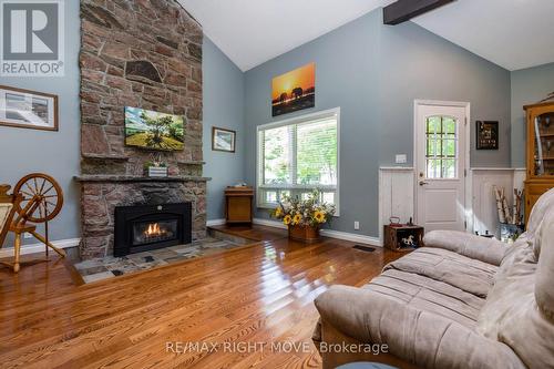 1032 Cowbell Lane, Gravenhurst, ON - Indoor Photo Showing Living Room With Fireplace