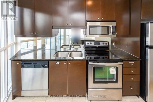 610 - 50 Absolute Avenue, Mississauga (City Centre), ON - Indoor Photo Showing Kitchen With Double Sink