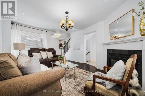 69 Wooliston Crescent, Brampton (Fletcher'S West), ON - Indoor Photo Showing Living Room With Fireplace