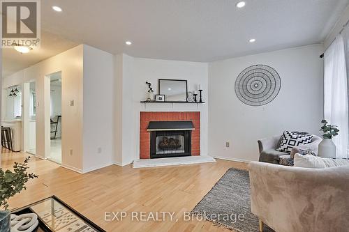 67 - 200 Murison Boulevard, Toronto (Malvern), ON - Indoor Photo Showing Living Room With Fireplace