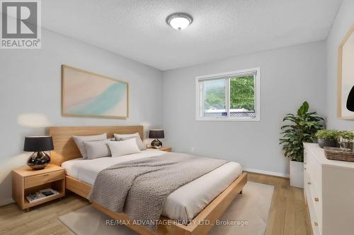 Virtually staged 2nd bedroom - 1 - 515 Proudfoot Lane, London, ON - Indoor Photo Showing Bedroom