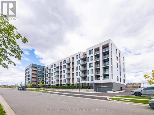 108 - 1440 Clarriage Court, Milton, ON - Outdoor With Facade