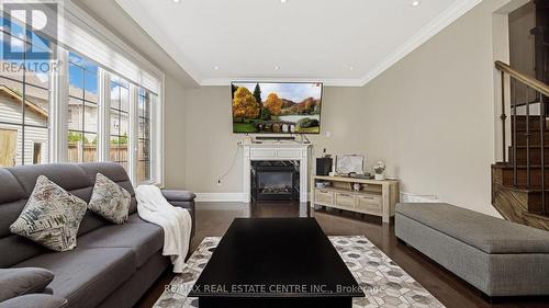 8 Coach House Court, Brampton, ON - Indoor Photo Showing Living Room With Fireplace