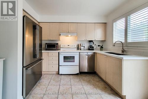 5147 Ravine Crescent, Burlington (Orchard), ON - Indoor Photo Showing Kitchen With Double Sink