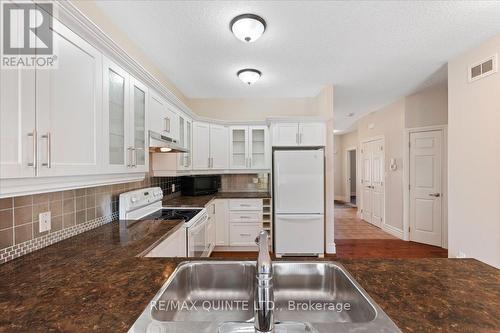 12 - 1 Rosemary Court, Prince Edward County (Picton), ON - Indoor Photo Showing Kitchen With Double Sink