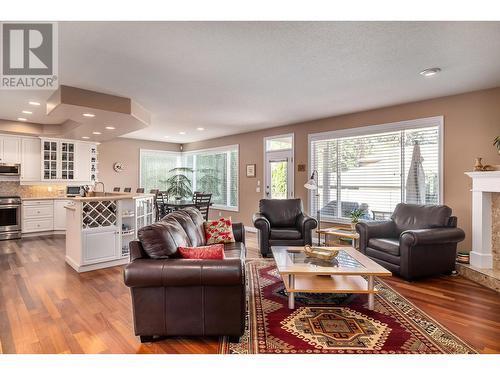 843 Woodhaven Court, Kelowna, BC - Indoor Photo Showing Living Room With Fireplace