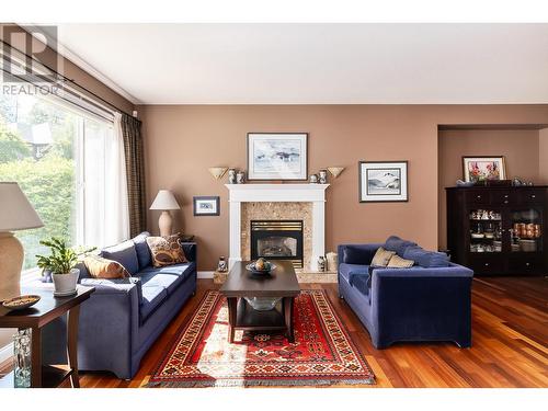 843 Woodhaven Court, Kelowna, BC - Indoor Photo Showing Living Room With Fireplace