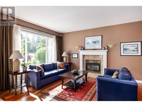 843 Woodhaven Court, Kelowna, BC - Indoor Photo Showing Living Room With Fireplace