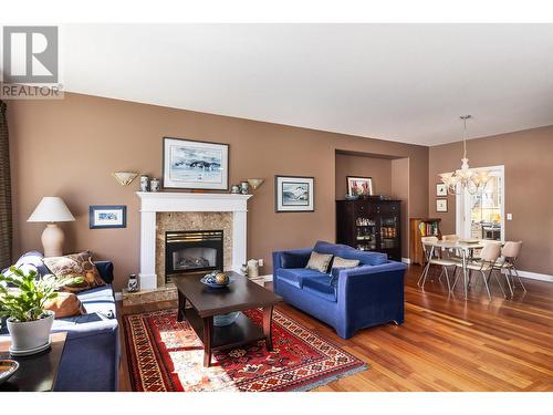 843 Woodhaven Court, Kelowna, BC - Indoor Photo Showing Living Room With Fireplace