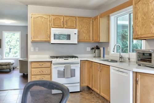 1749 Highland Drive, Kelowna, BC - Indoor Photo Showing Kitchen With Double Sink