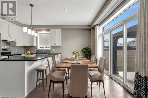 Virtual Staging For reference only - 605 Sundew Drive, Waterloo, ON - Indoor Photo Showing Dining Room