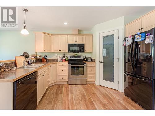 725 Trans Canada Frontage Road, Sicamous, BC - Indoor Photo Showing Kitchen With Double Sink