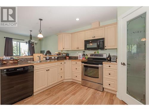 725 Trans Canada Frontage Road, Sicamous, BC - Indoor Photo Showing Kitchen With Double Sink