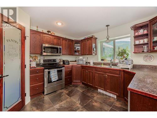 725 Trans Canada Frontage Road, Sicamous, BC - Indoor Photo Showing Kitchen With Double Sink