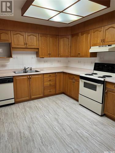 102 2405 1St Avenue W, Prince Albert, SK - Indoor Photo Showing Kitchen With Double Sink