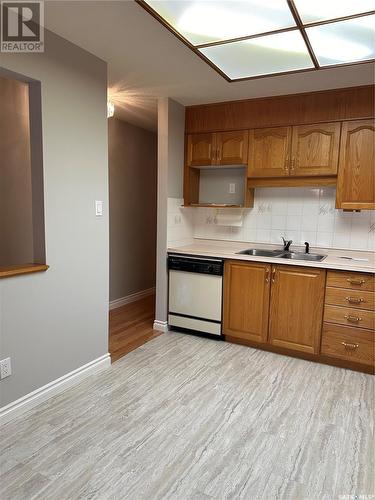 102 2405 1St Avenue W, Prince Albert, SK - Indoor Photo Showing Kitchen With Double Sink