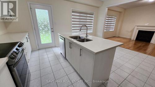 263 Fleetwood Dr Drive, Oshawa, ON - Indoor Photo Showing Kitchen With Fireplace With Double Sink