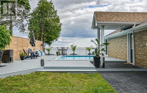 59 Cedar Crest Beach Road, Clarington (Bowmanville), ON - Outdoor With In Ground Pool