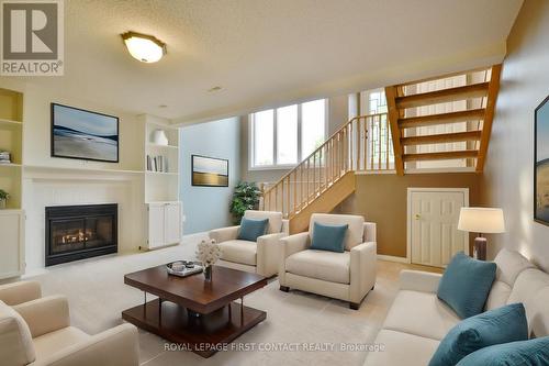 61 Holly Meadow Road N, Barrie (Holly), ON - Indoor Photo Showing Living Room With Fireplace