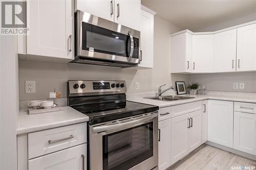 206 315 Dickson Crescent, Saskatoon, SK - Indoor Photo Showing Kitchen With Double Sink