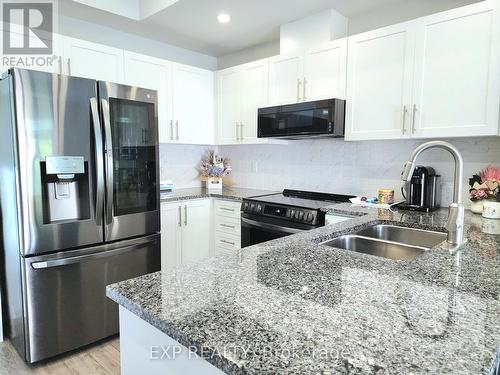 10 - 383 Dundas Street E, Hamilton, ON - Indoor Photo Showing Kitchen With Stainless Steel Kitchen With Double Sink With Upgraded Kitchen