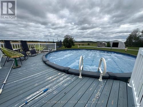 888144 Hwy 65 W, Timiskaming Remote Area, ON - Outdoor With Above Ground Pool With Deck Patio Veranda