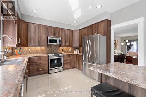 59 Carley Crescent, Barrie (Painswick North), ON - Indoor Photo Showing Kitchen With Stainless Steel Kitchen With Double Sink With Upgraded Kitchen