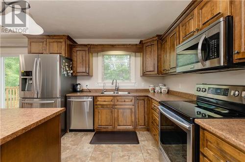 21 Chad Crescent, Salisbury, NB - Indoor Photo Showing Kitchen With Double Sink