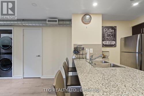 318 - 1410 Dupont Street, Toronto (Dovercourt-Wallace Emerson-Junction), ON - Indoor Photo Showing Kitchen With Double Sink