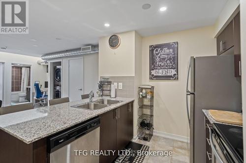 318 - 1410 Dupont Street, Toronto (Dovercourt-Wallace Emerson-Junction), ON - Indoor Photo Showing Kitchen With Double Sink