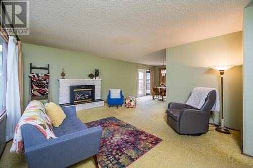 4157 Stevens Drive, Prince George, BC - Indoor Photo Showing Living Room With Fireplace