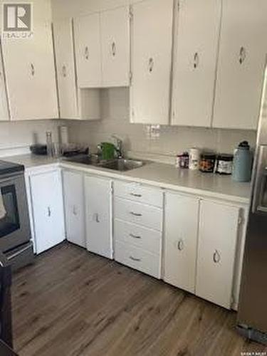 1436 Minto Street, Regina, SK - Indoor Photo Showing Kitchen With Double Sink