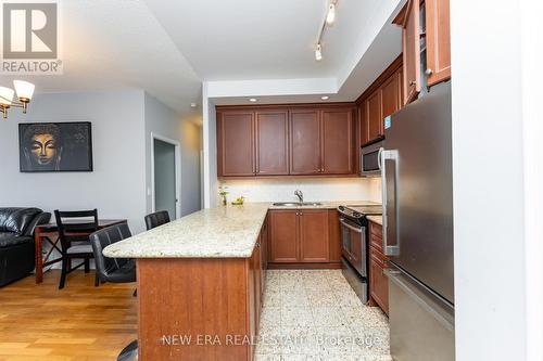 1606 - 21 Grand Magazine Street, Toronto (Niagara), ON - Indoor Photo Showing Kitchen