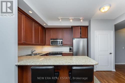 1606 - 21 Grand Magazine Street, Toronto (Niagara), ON - Indoor Photo Showing Kitchen With Double Sink