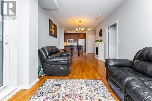 1606 - 21 Grand Magazine Street, Toronto (Niagara), ON - Indoor Photo Showing Living Room