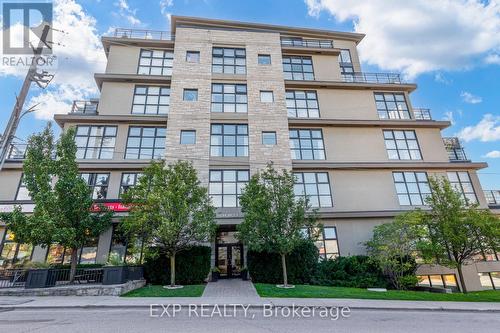 212 - 160 Fallingbrook Road, Toronto (Birchcliffe-Cliffside), ON - Outdoor With Facade