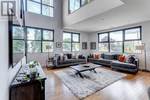 212 - 160 Fallingbrook Road, Toronto (Birchcliffe-Cliffside), ON - Indoor Photo Showing Living Room