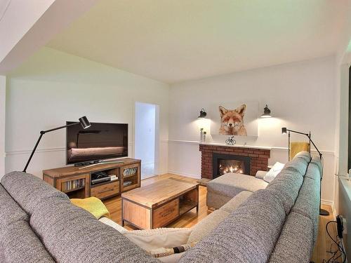 Living room - 120 10E Avenue, Senneterre - Ville, QC - Indoor Photo Showing Living Room With Fireplace