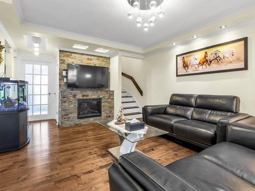 Salon - 4591 Av. Du Château-Pierrefonds, Montréal (Pierrefonds-Roxboro), QC - Indoor Photo Showing Living Room With Fireplace