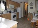 34 770 N 11Th Avenue, Williams Lake, BC  - Indoor Photo Showing Kitchen With Double Sink 