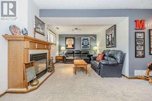 100 Windsor Drive, Brant (South Dumfries), ON - Indoor Photo Showing Living Room With Fireplace