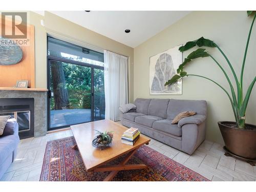 5703 Westport Wynd, West Vancouver, BC - Indoor Photo Showing Living Room With Fireplace