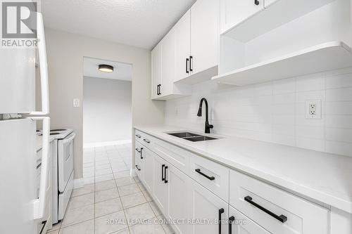 211 - 936 Glen Street, Oshawa, ON - Indoor Photo Showing Kitchen With Double Sink