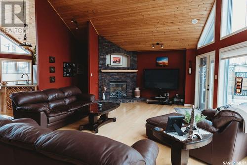 134 Collins Street, Creighton, SK - Indoor Photo Showing Living Room With Fireplace