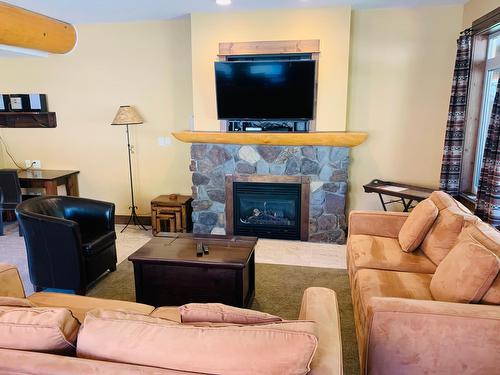 M1-D - 1351 Gerry Sorensen Way, Kimberley, BC - Indoor Photo Showing Living Room With Fireplace