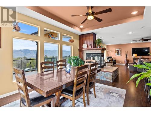 7629 Barnhartvale Road, Kamloops, BC - Indoor Photo Showing Dining Room With Fireplace