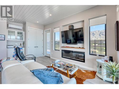 2501 Radio Tower Road Unit# 223, Oliver, BC - Indoor Photo Showing Living Room With Fireplace