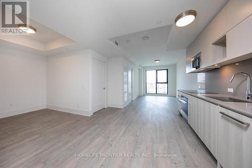 219 - 118 Merchants' Wharf, Toronto (Waterfront Communities), ON - Indoor Photo Showing Kitchen